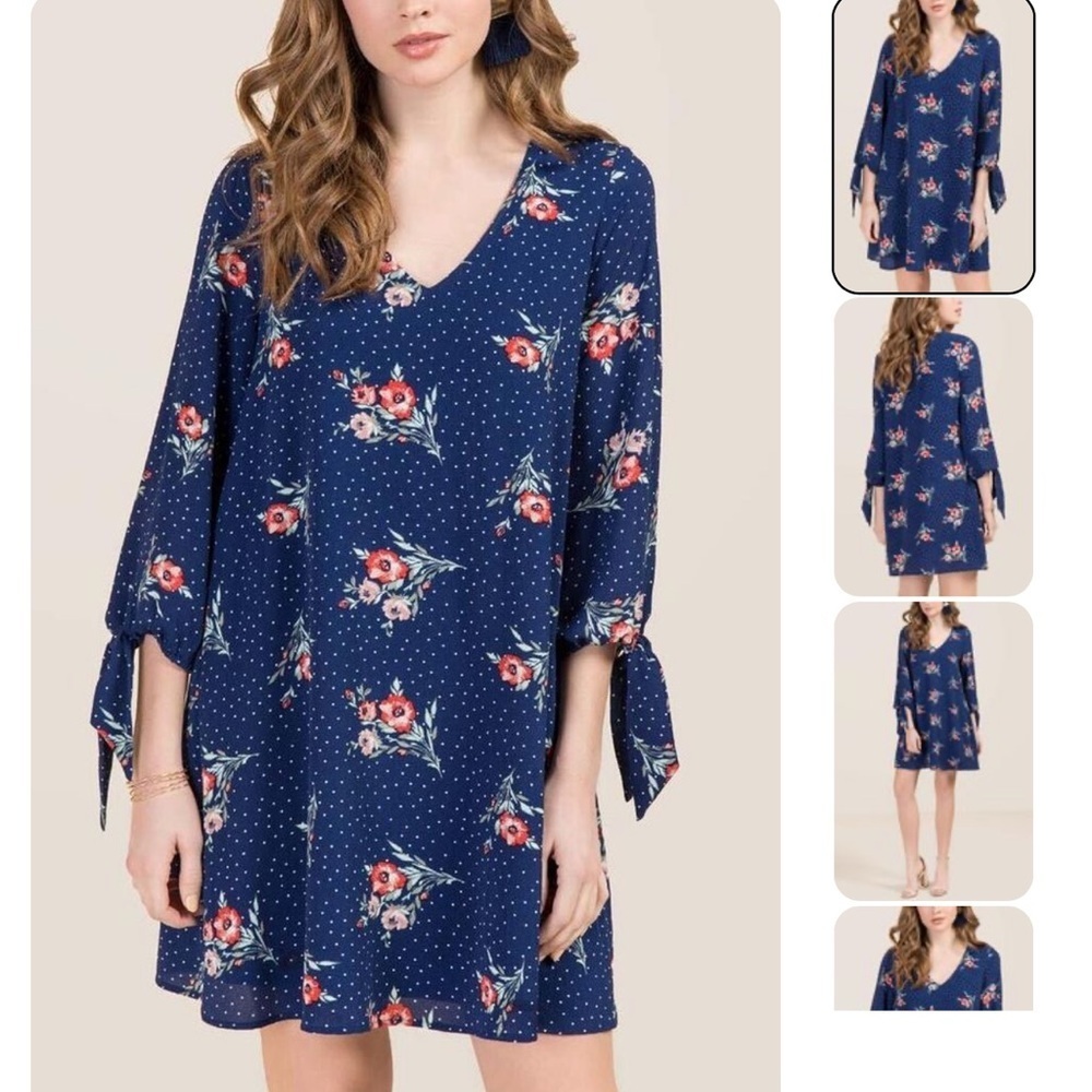 Miami Polk a dot floral midi dress with 3/4 sleeve and peep hole back size S